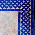 Taula amb mosaic Reixa